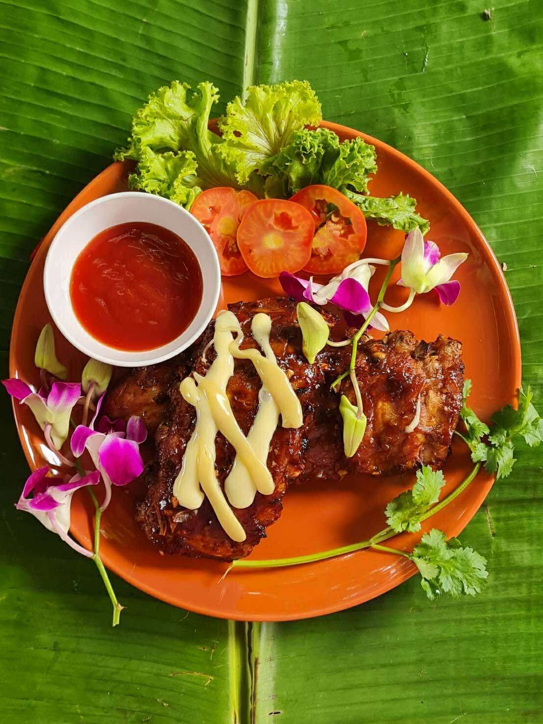 Thai dishes served on banana leaf at Baan Rao